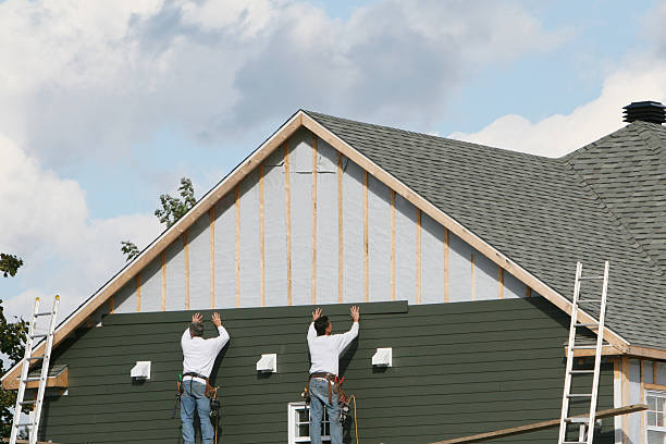 Professional Storm Damage Siding Repair technician working in Honey Grove, PA